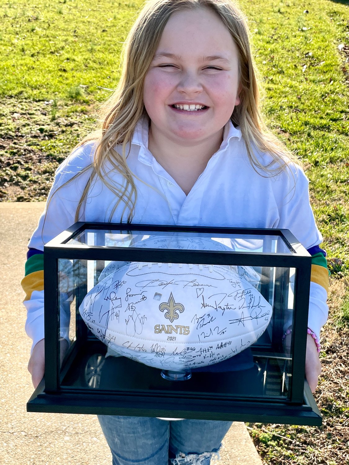 Izzy Sherman got a football from the New Orleans Saints.
